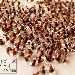 【約210粒】【チェコビーズ/ミニデュオ】クリスタルブラウンライン(4×2mm/二つ穴)/１０g 1枚目の画像