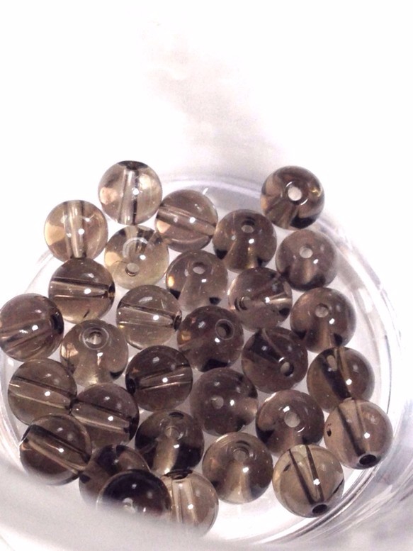 -【丸珠穴有】茶水晶（スモーキークォーツ） 6mm 　丸玉　天然石 8粒 2枚目の画像