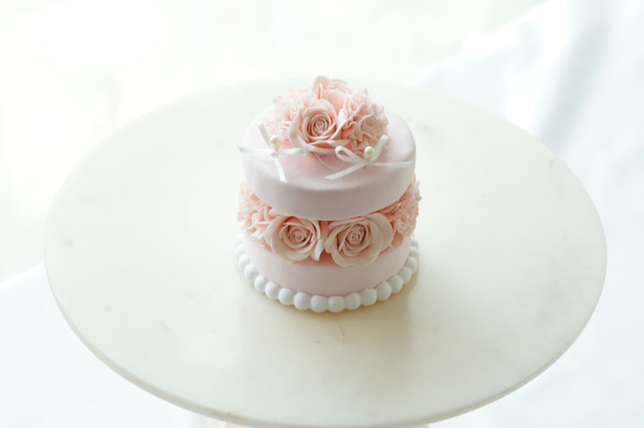 乳粉色花蛋糕環枕 第2張的照片