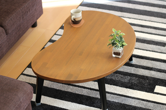 折りたたみ　そら豆テーブル　「まめっこ」無垢材ローテーブル　自然塗装　横幅89㎝　チーク色　アイアン脚 1枚目の画像