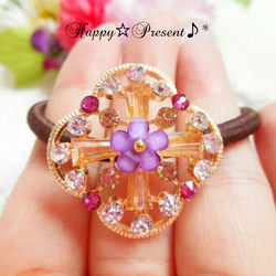 ラプンツェルのスワロフスキーprincessキラキラ✴flowerヘアゴム