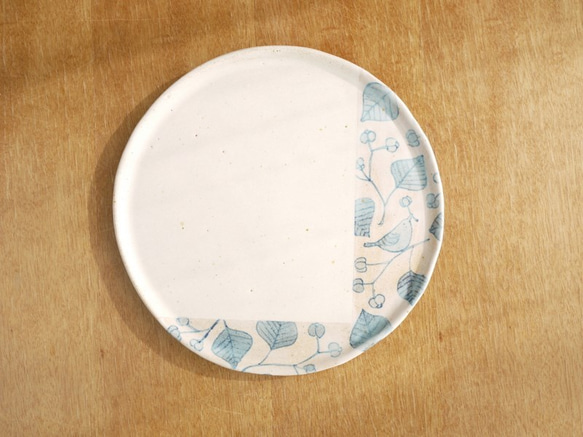 白色的圓碟（中國牛油和鳥） 第1張的照片