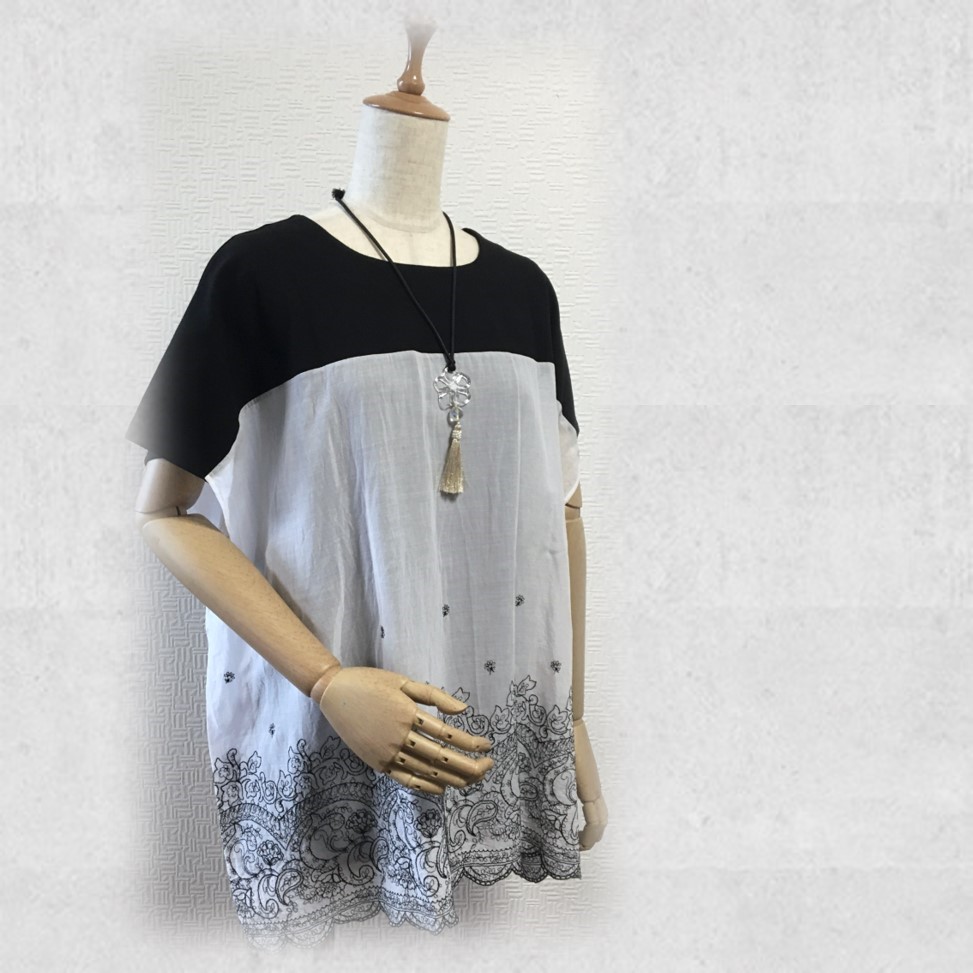 繊細な刺繍レースがエスニックモダンなドルマンチュニック