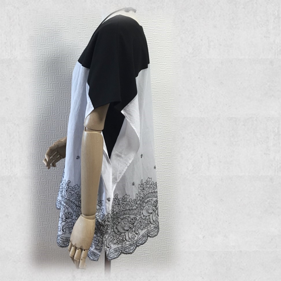 繊細な刺繍レースがエスニックモダンなドルマンチュニック