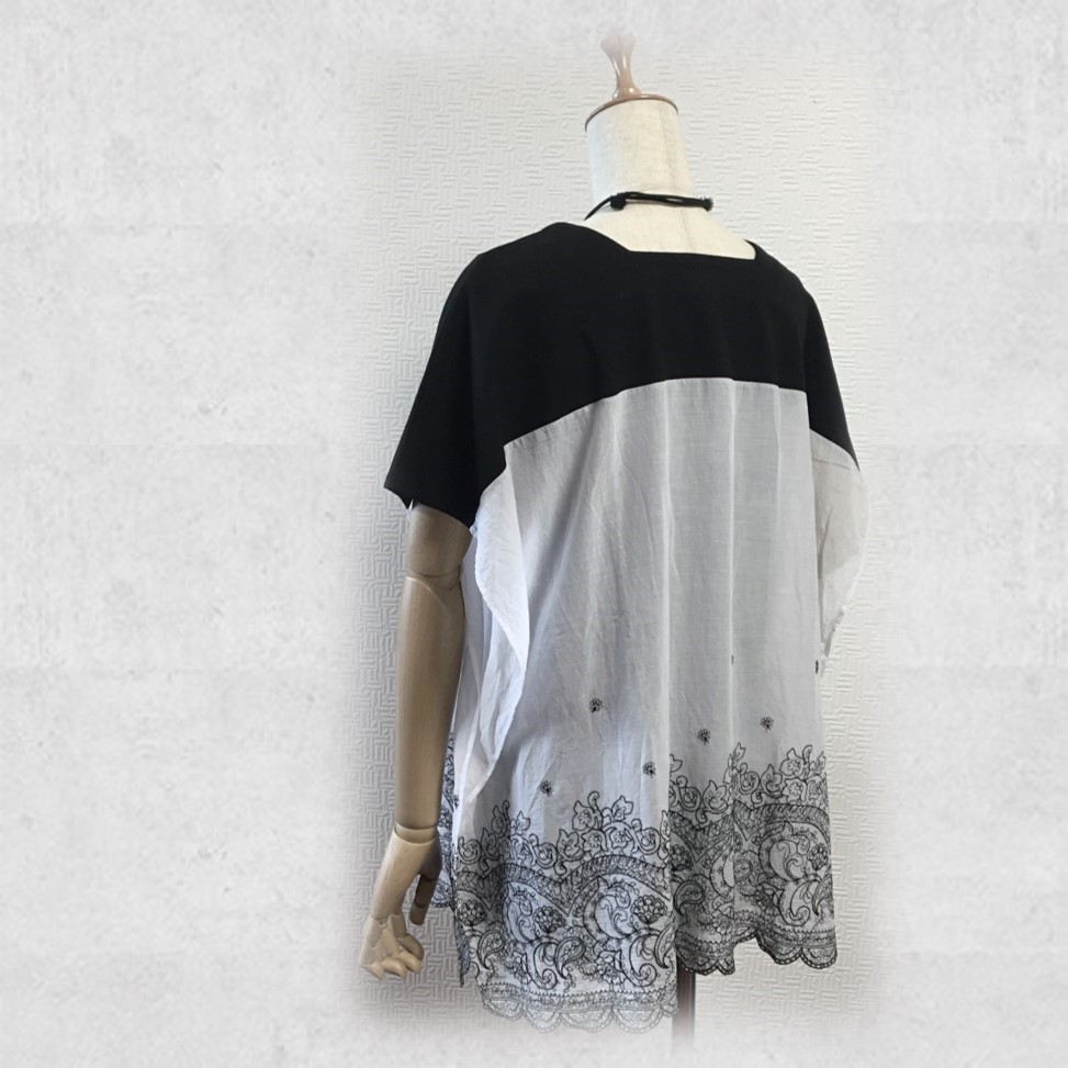 繊細な刺繍レースがエスニックモダンなドルマンチュニック