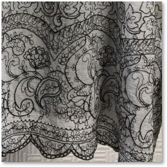 繊細な刺繍レースがエスニックモダンなドルマンチュニック