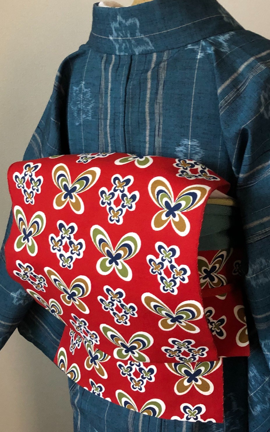 木綿　作り名古屋帯　朱赤地に蝶々柄