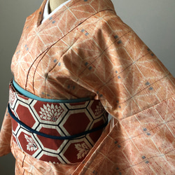 正絹　手縫い単衣紬　コーラルオレンジに麻の葉模様 1枚目の画像