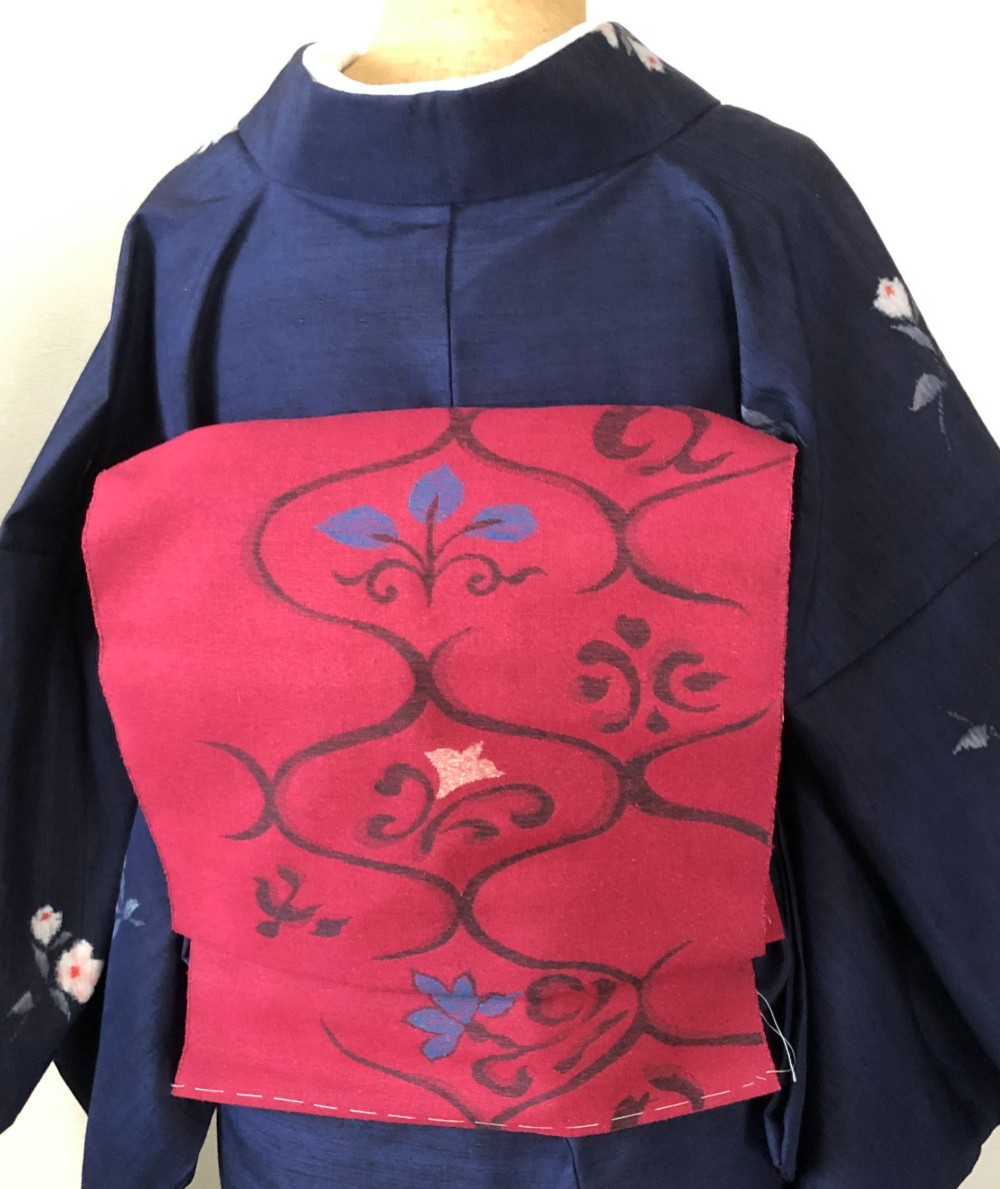 正絹　八寸紬名古屋帯　ボルドーに手書き風の花模様