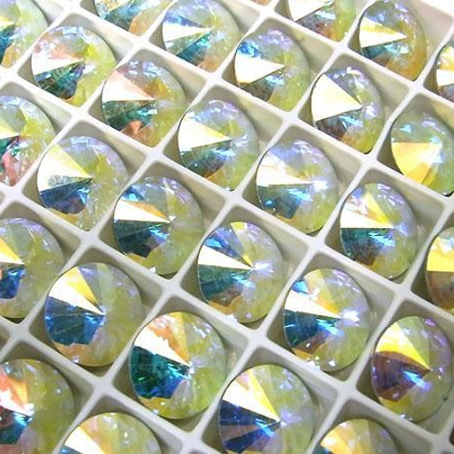 スワロフスキー art.1122 PERIDOT ss47 リボリ72個 - メルカリ