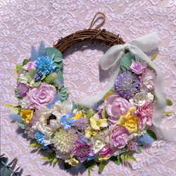 ＊Flower wreathe♡ピンク×ブルー×イエローのパステルリース♡アーティフィシャルフラワー♡27㎝×30㎝＊ 1枚目の画像