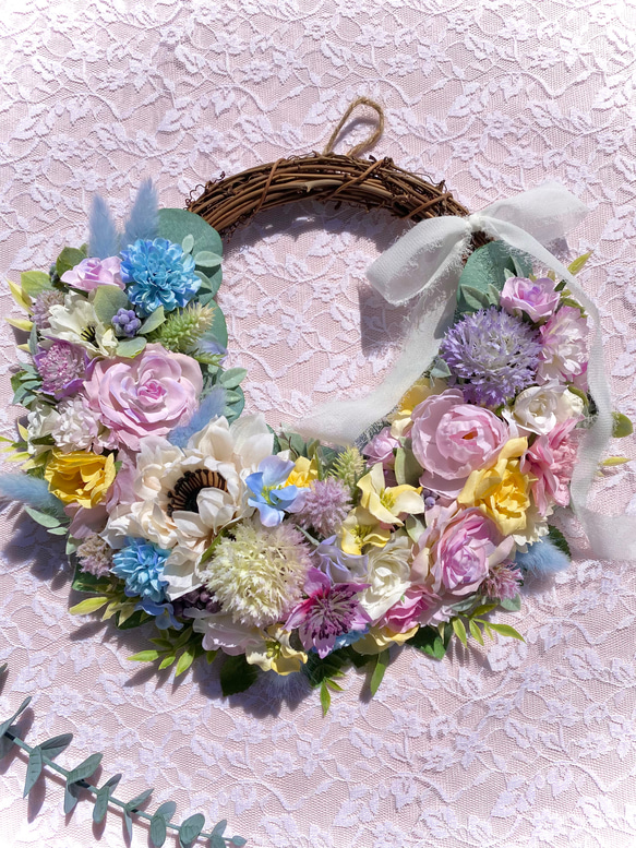 ＊Flower wreathe♡ピンク×ブルー×イエローのパステルリース♡アーティフィシャルフラワー♡27㎝×30㎝＊ 3枚目の画像