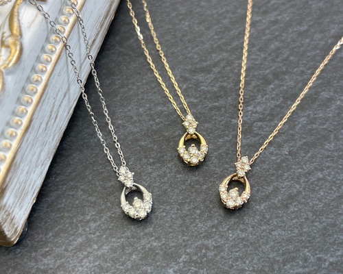 Pt850 / K18 ダイヤモンド ペンダントトップ D: 0.11ct