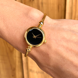 【閉店セール 50% OFF】ブレスレット バングル腕時計 シンプル ブラック文字盤 ゴールドカラー 1枚目の画像