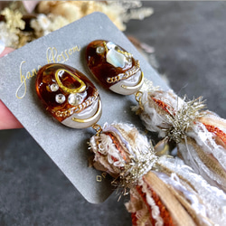 glass oval tortoiseshell tassel Earrings 3枚目の画像