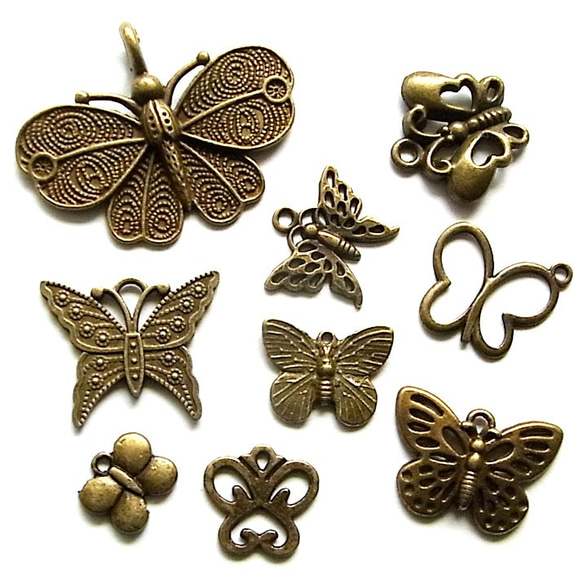 蝶チャームセット アンティークゴールド 7種以上20個入 1枚目の画像