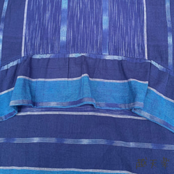 裾切り替えバルーンと裾フリルが前と後ろで表情を変える前開き手織りワンピース　青絣 8枚目の画像