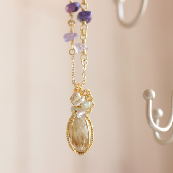 Rutilelated-quartz necklace 第6張的照片