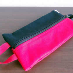 紅色×黑色獨特設計容量大“雙面扣件袋” 第1張的照片