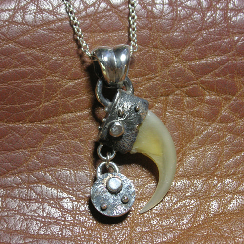 オオヤマネコ爪ペンダント ネックレス・ペンダント 宇宙のかけら 通販