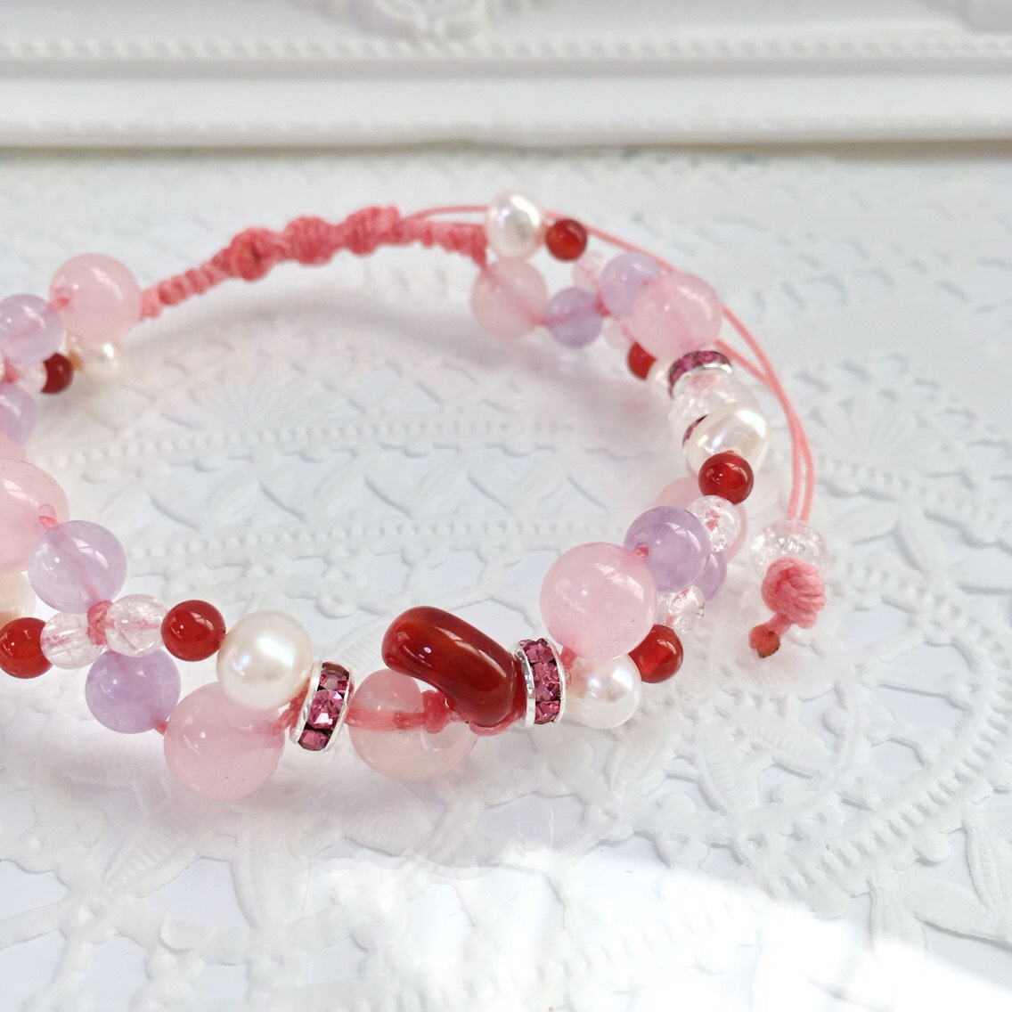 受注制作☆出雲勾玉の編み込みブレス☆ローズクォーツ☆ピンク系 5,600円