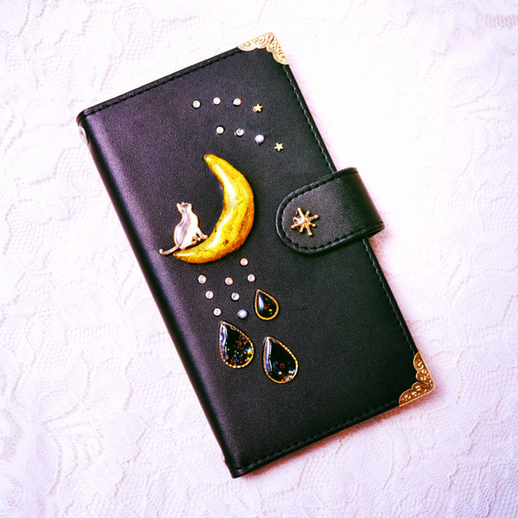 ひなゆうさま専用☆Xperia xz用  手帳型スマホケース『猫と月のいる星空-黒-』 1枚目の画像