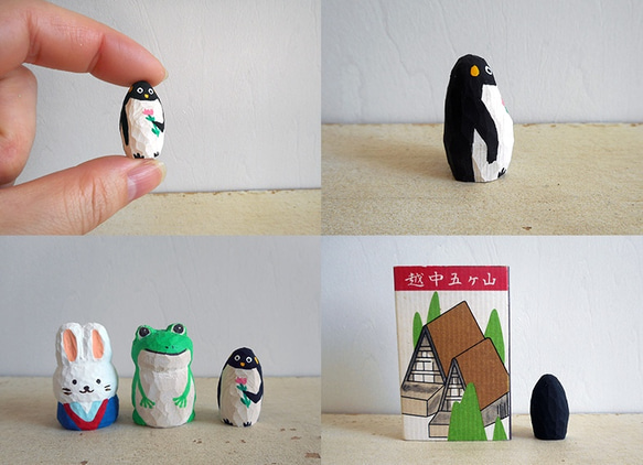 木彫り　子供ペンギン　花をもつ37 2枚目の画像