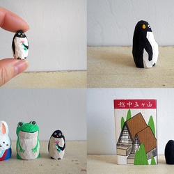 木彫り　子供ペンギン　花をもつ47 2枚目の画像