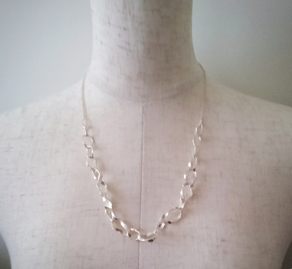 ”to be continued"silver necklace 第4張的照片