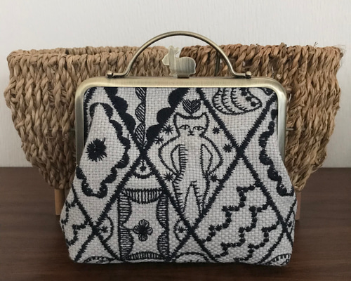 ハンドメイド　がま口長財布　ミナペルホネン　jungle relief ミナペルホネン symphonyで作成しましたお財布がま口です♡うさぎさん