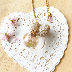 《Sold》『さくらまもり*』桜とペリドットとスワロフスキーの桜ウォータードームネックレス 2枚目の画像