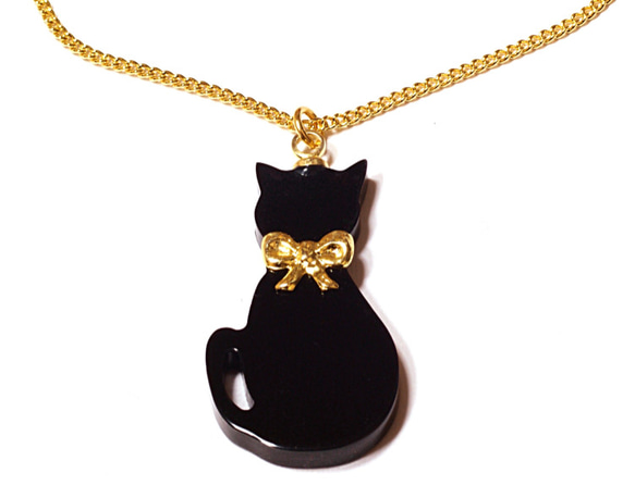 小さな金色リボン首輪の黒猫が揺れるゴールド・ペンダント・ネックレス 1枚目の画像