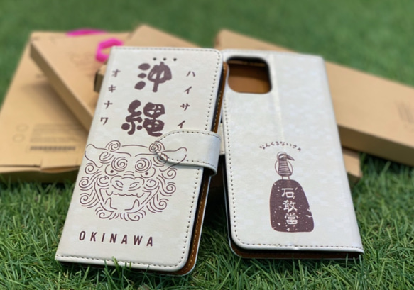 【送料無料】OKINAWA シーサー ヤンバルクイナ 花 沖縄 iPhoneケース・スマホカバー 1枚目の画像