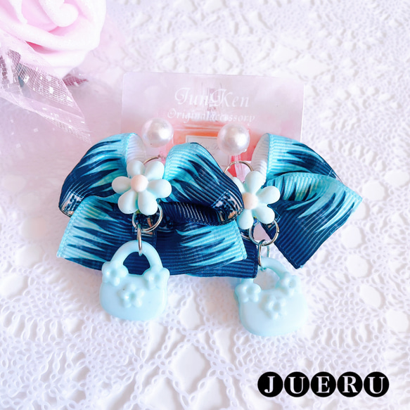 ハンドメイド★キッズリボン★水色★大きめ★揺れるチャーム付き★お出かけに ハンドメイド☆キッズリボン☆水色☆大きめ☆揺れるチャーム付き