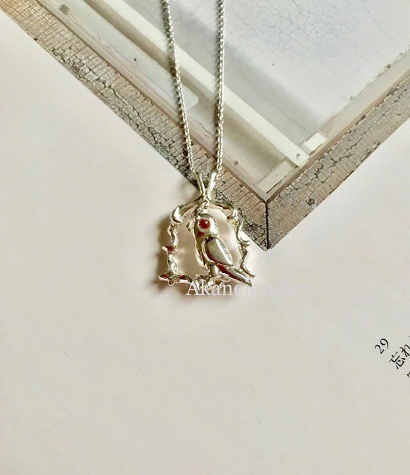 ほっぺがオレンジサファイア　オカメインコのネックレス 2枚目の画像