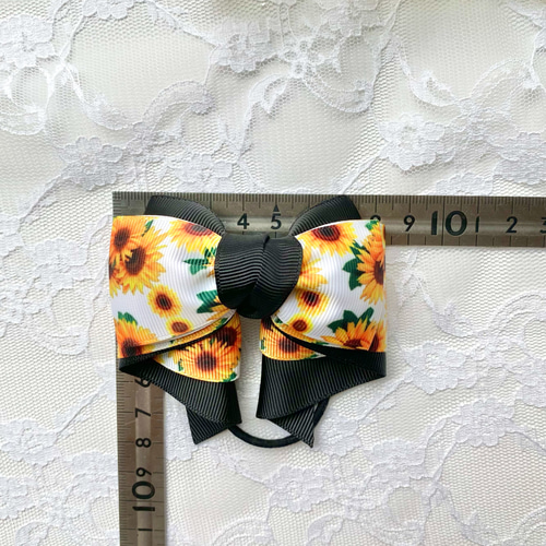 コーデ力抜群♡毎日つけられるブラック×ひまわり柄のリボン/ヘアゴム  