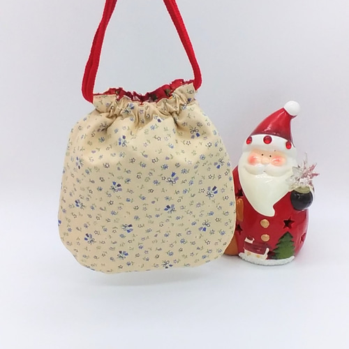 クリスマス※リバーシブル巾着ポーチ☆サンタクロースと雪だるま&花柄