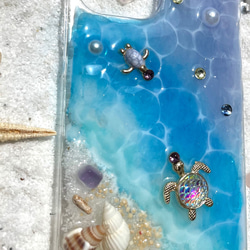 iPhoneクリアケース 海からのプレゼントスマホカバー 幸運を呼ぶオルゴナイトiPhone14シリーズ全対応 光る砂浜 10枚目の画像