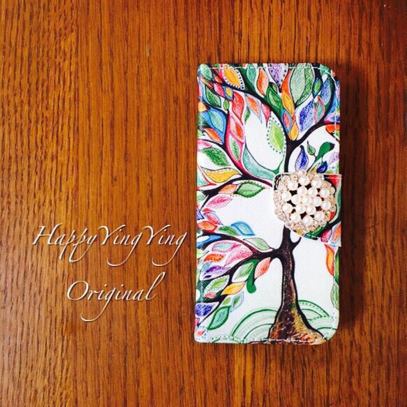 【iPhone6/6S】幸せの木手帳型ケース 1枚目の画像