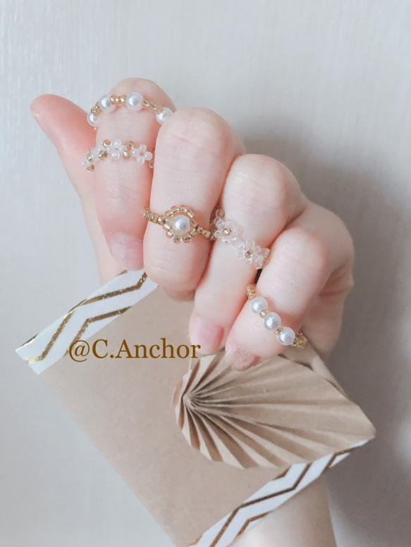 かわいい!　パール　リング　ゴールド　ピンクパープルの花びらつき お花のビーズリング.＊ パープル×クリア 2点セット - pale fleur