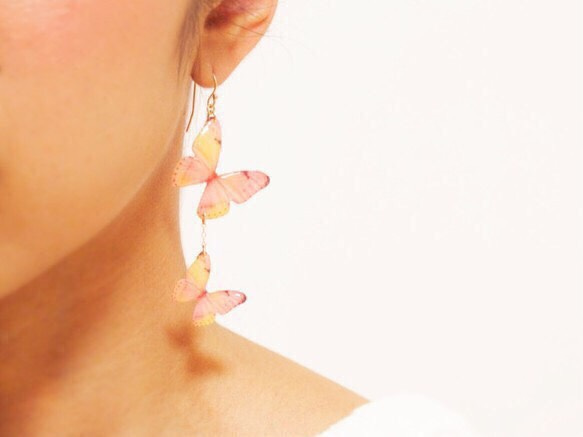 \媒體精選作品/櫻花色蝴蝶耳環（不對稱） 第7張的照片