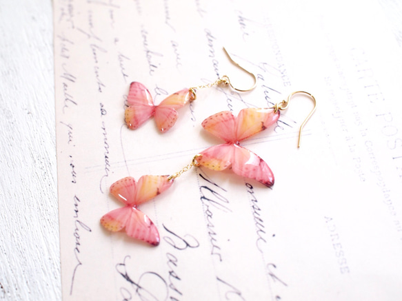 \媒體精選作品/櫻花色蝴蝶耳環（不對稱） 第8張的照片