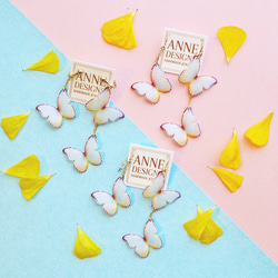 泛白蝴蝶 耳環/耳夾式耳環（不對稱） 第2張的照片