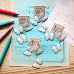 泛白蝴蝶 耳環/耳夾式耳環（不對稱） 第7張的照片