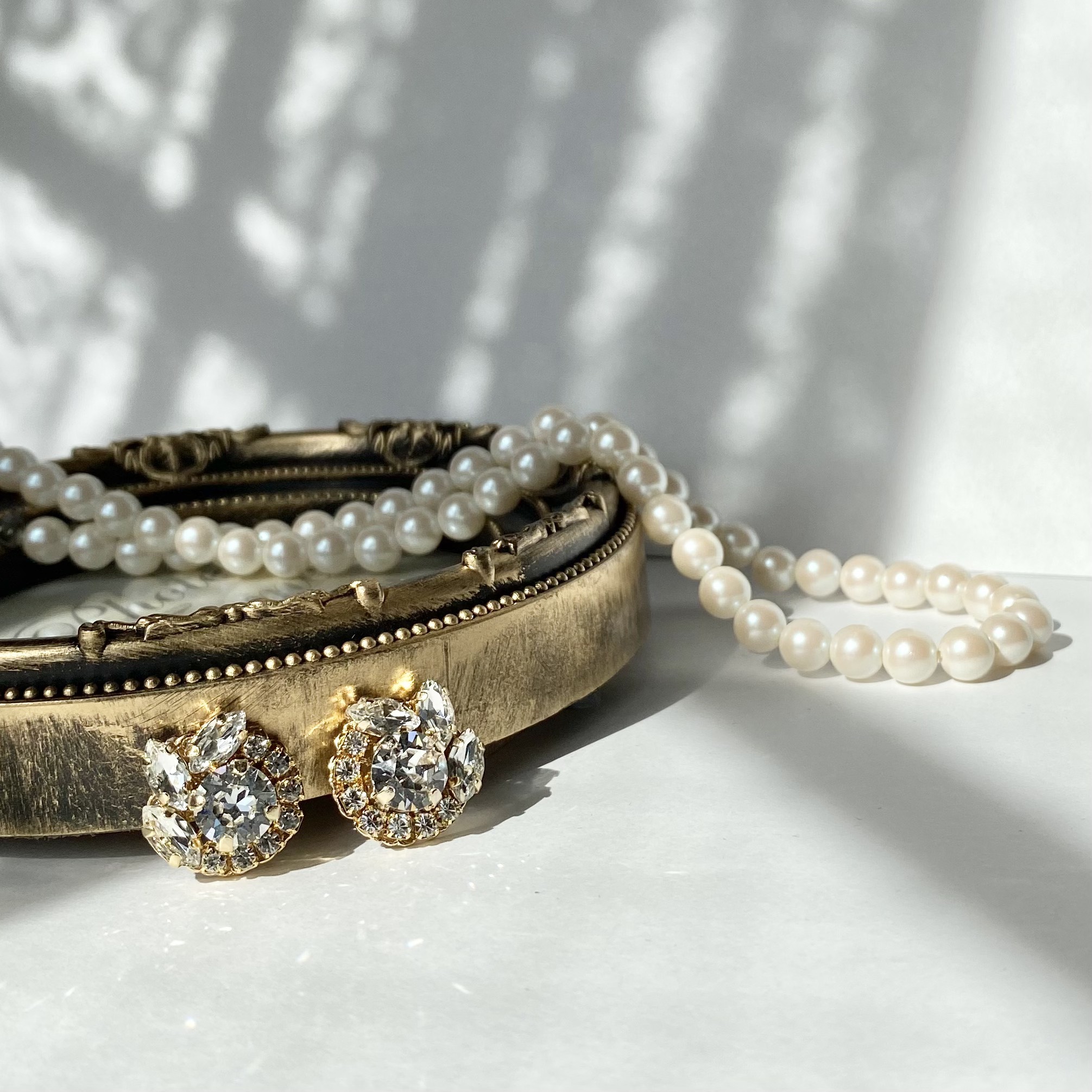 フェザーモチーフイヤリング　（クリア・ゴールド）　バレエ