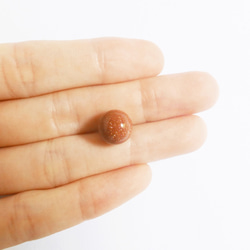 金砂岩圓球（直徑12毫米） 經峇裡島僧侶祈禱淨化的天然石材，可以激發您的靈魂，幫助您實現目標。 第3張的照片