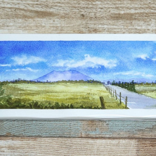 水彩画 背景イラスト『遥かなる道と桜島』 イラスト 有馬憲吾 通販