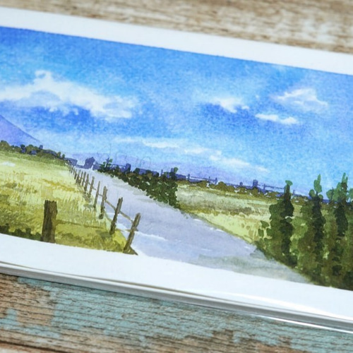 水彩画 背景イラスト『遥かなる道と桜島』 イラスト 有馬憲吾 通販