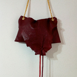 ​Wine red leather asymmetric raw edge bag 1枚目の画像
