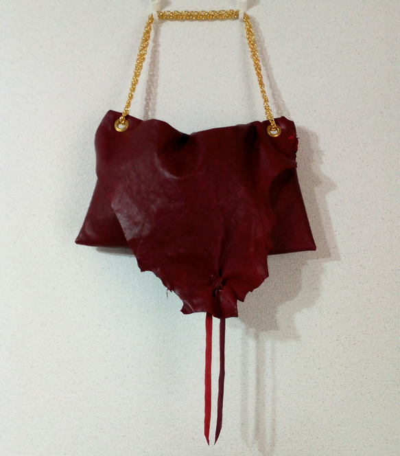 ​Wine red leather asymmetric raw edge bag 1枚目の画像